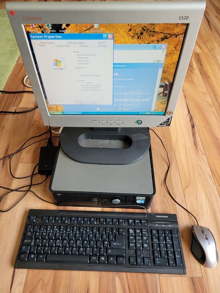 Computadora Dell Optiplex 745 con monitor, teclado y mouse Compaq 1520: funcionando.